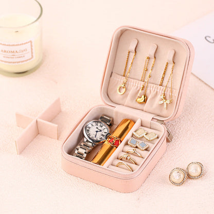 Pink PU leather travel jewelry organizer, with watch, ring, earrings, necklace storage, perfect for gifts.