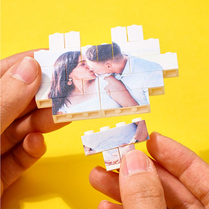 Assembling heart-shaped photo block puzzle featuring a couple's image, perfect personalized gift, DIY fun.
