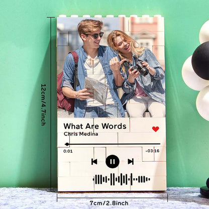 Personalized photo brick puzzle with couple's photo, music code, and song details, a romantic and unique gift.