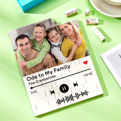 Personalized family photo brick puzzle with music code and song details, a unique gift.