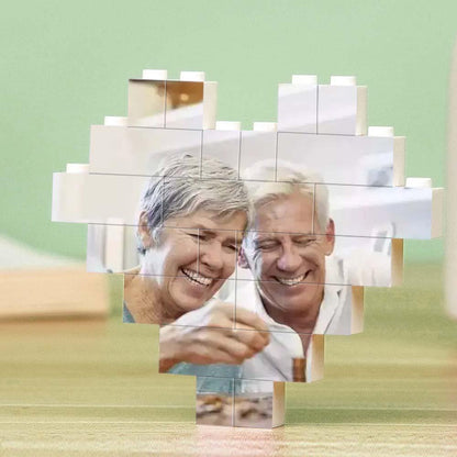 Heart-shaped photo block puzzle with elderly couple image, white interlocking bricks, personalized DIY gift