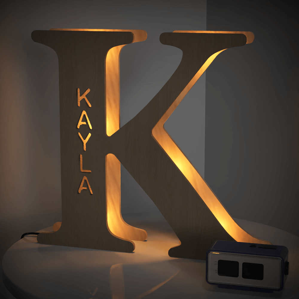 Personalized wooden letter K night light with KAYLA engraved, warm glow, 19CM, custom name lamp.